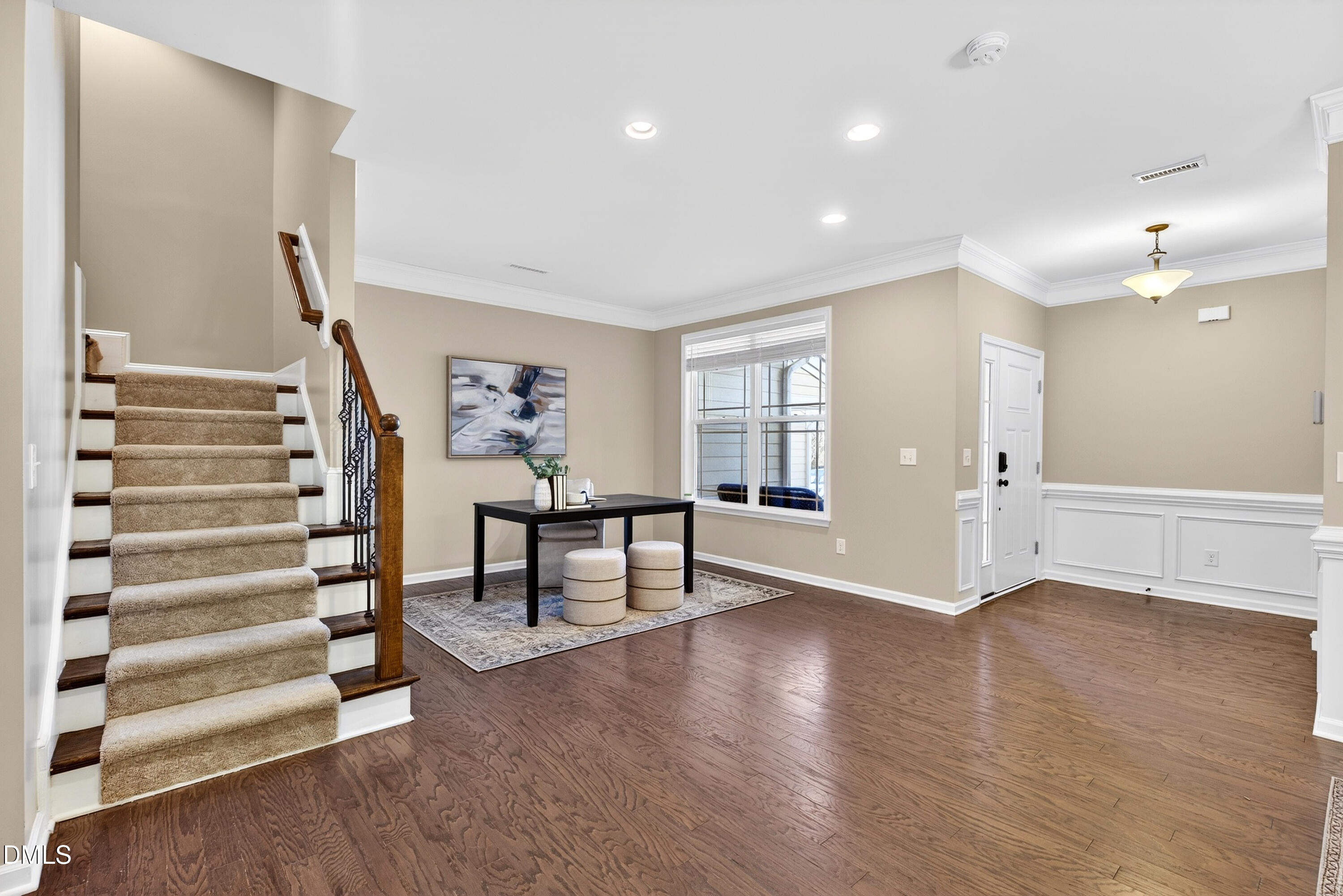 109 Willow View Lane Apex, NC 27539 - Photo 7 of 72 a view of entryway with stairs and wooden floor