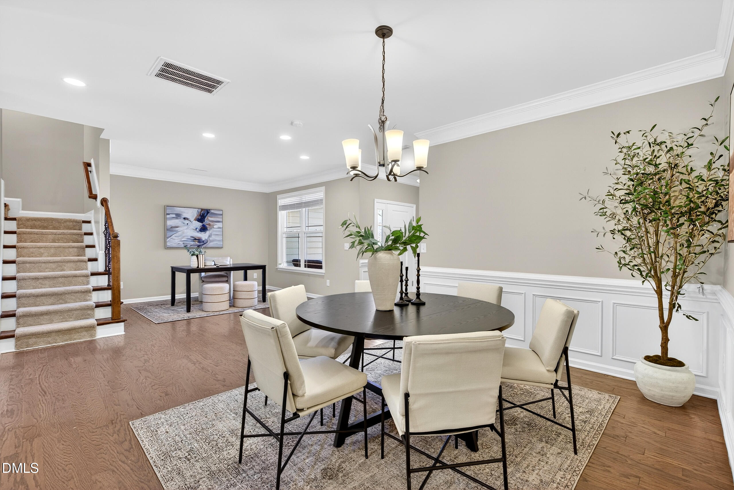109 Willow View Lane Apex, NC 27539 - Photo 10 of 72 a dining room with furniture and wooden floor