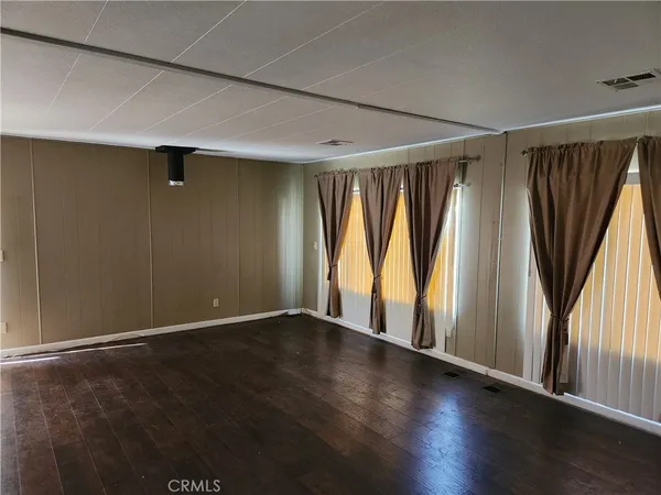 a large bathroom with a sink and mirror