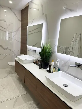 $419,000 | 2100 Van Buren Street, Unit 214, Hollywood, FL 33020
