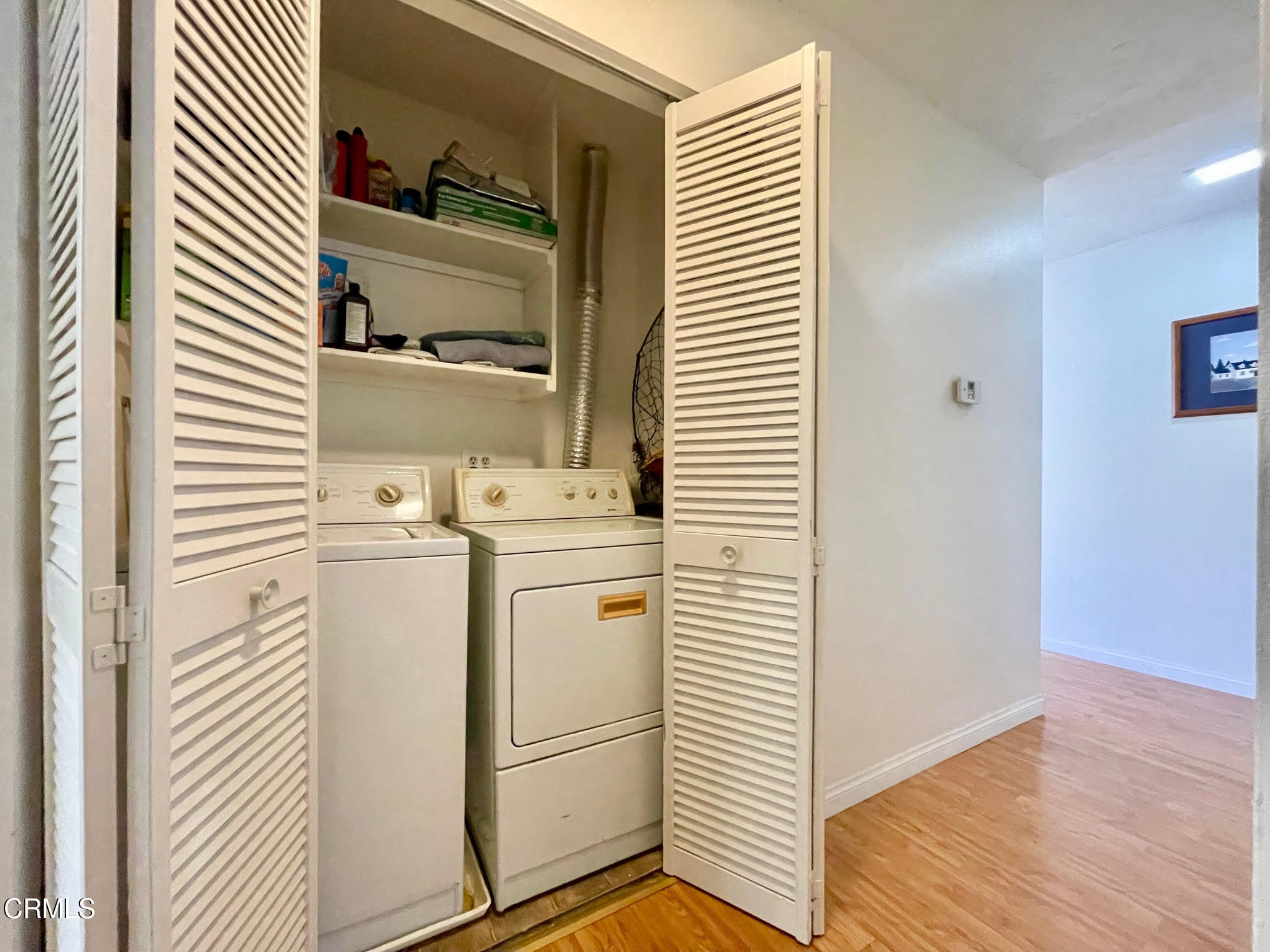 623 Sunfish Way Port Hueneme, CA 93041 - Photo 19 of 38 a utility room with cabinets washer and dryer