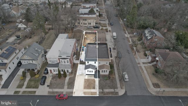 an aerial view of a city with lots of residential buildings