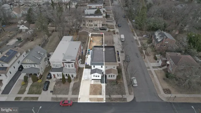 an aerial view of a city with lots of residential buildings