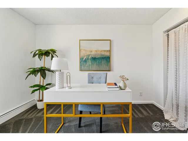a view of kitchen island with furniture and wooden floor