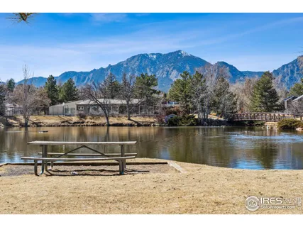 a view of a city with mountains in the background