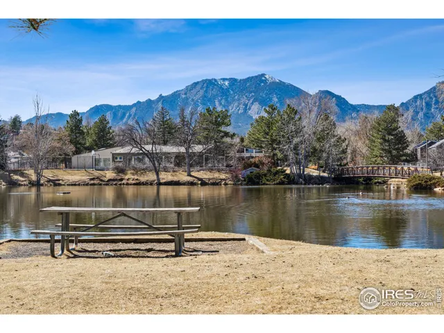 a view of a city with mountains in the background