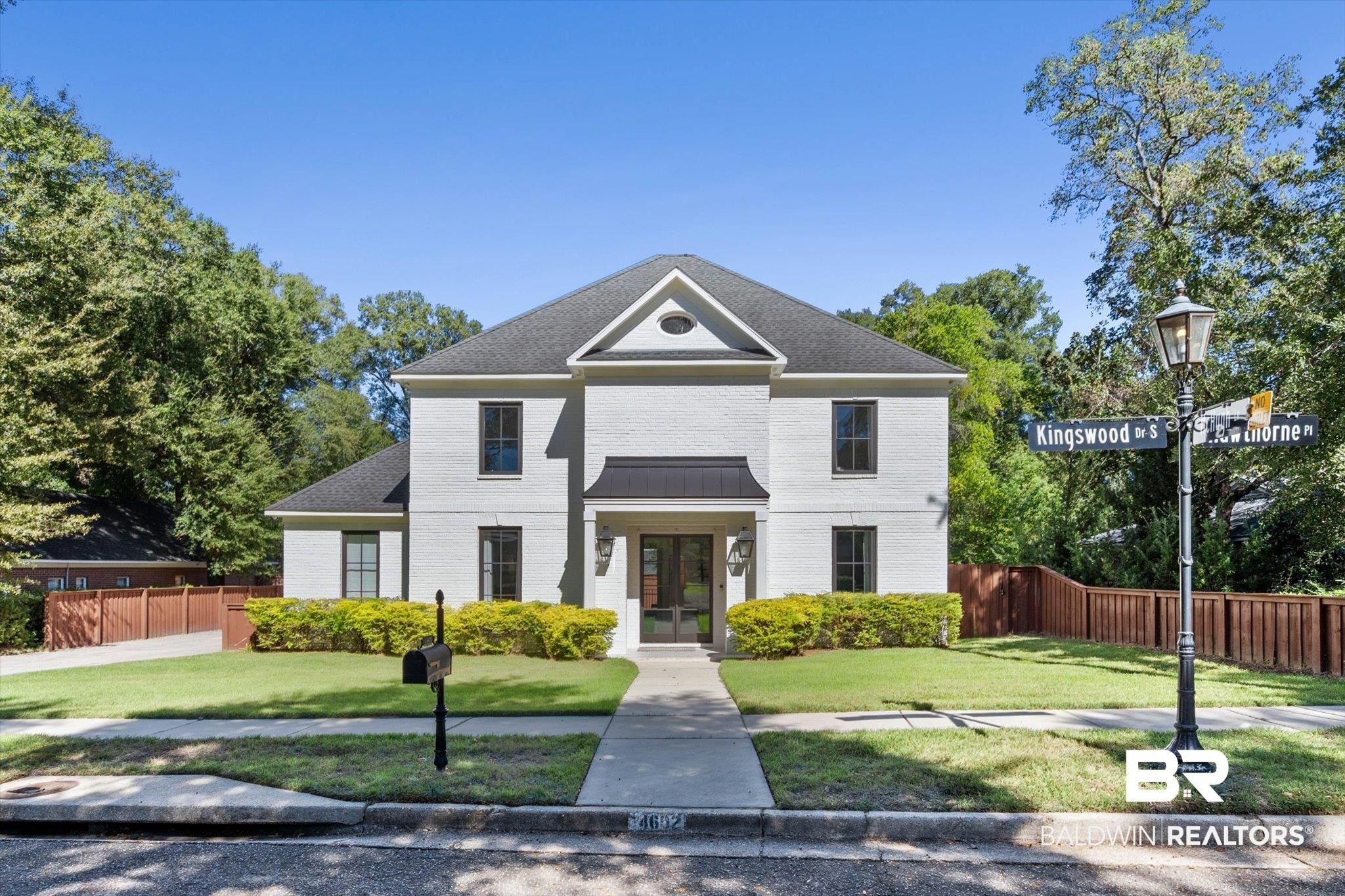 4602 Kingswood Drive Mobile, AL 36608 - Photo 41 of 45 View of front facade featuring brick siding and french doors