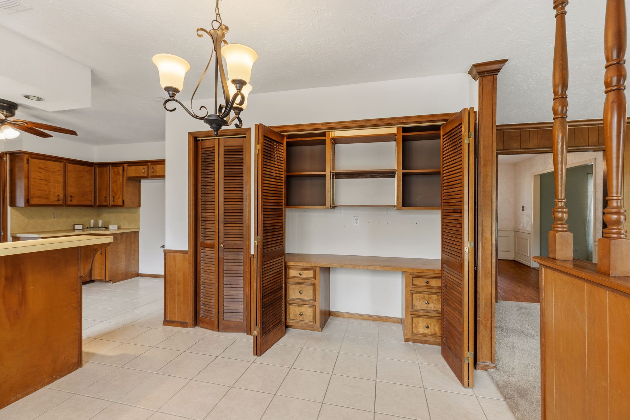 17507 Oxhill Court Spring, TX 77388 - Photo 17 of 44 These doors hide a desk area that can be a home office, a homework nook, or even a sewing desk!