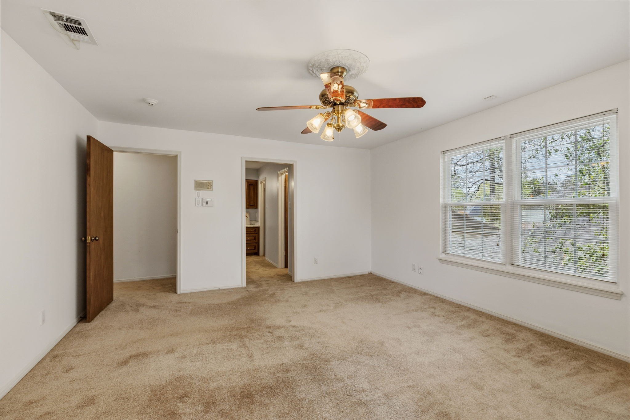 17507 Oxhill Court Spring, TX 77388 - Photo 23 of 44 The primary bedroom has a view over the backyard and its own ensuite with two primary closets!