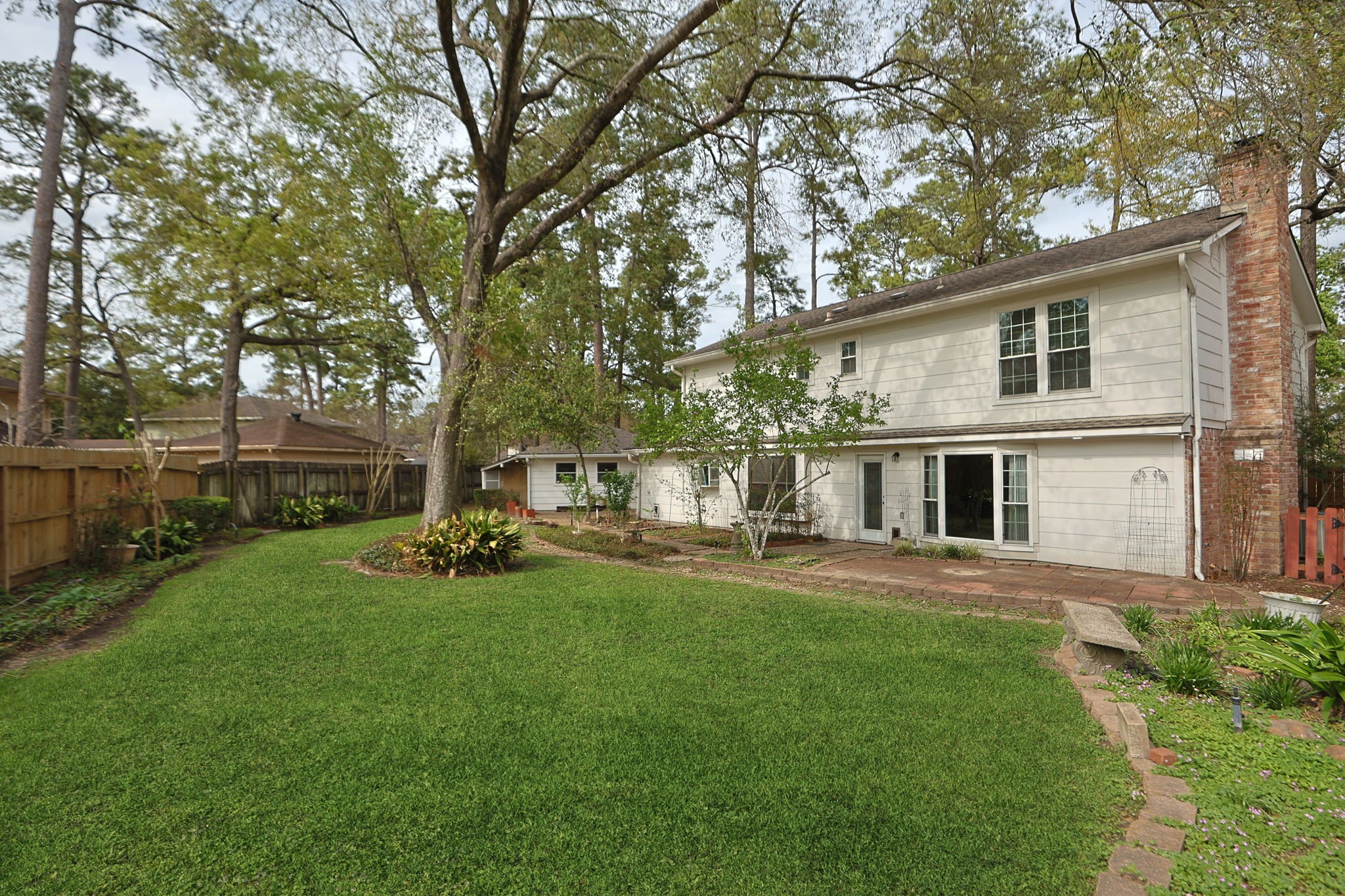 17507 Oxhill Court Spring, TX 77388 - Photo 31 of 44 Plenty of grassy space in the yard, and the patio is extensive!