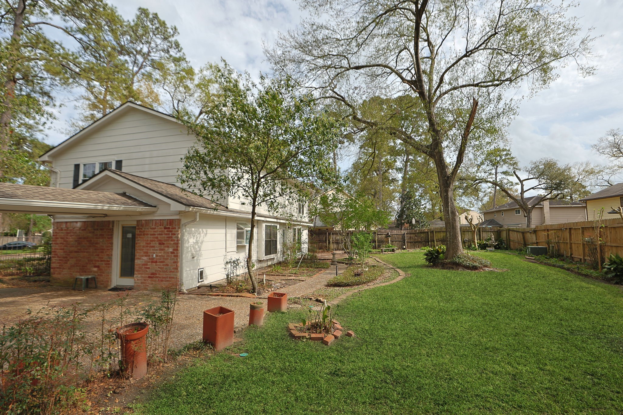 17507 Oxhill Court Spring, TX 77388 - Photo 32 of 44 Flower beds and planters are already established and waiting for your personal touch!