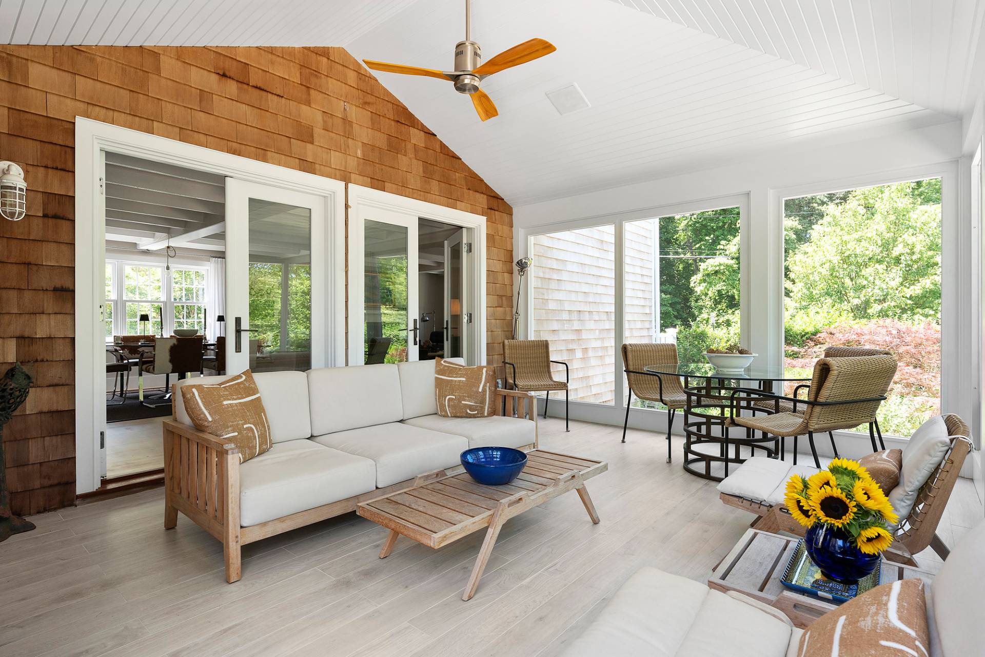 8 Fresh Pond Road Sag Harbor, NY 11963 - Photo 13 of 40 a living room with furniture and floor to ceiling windows