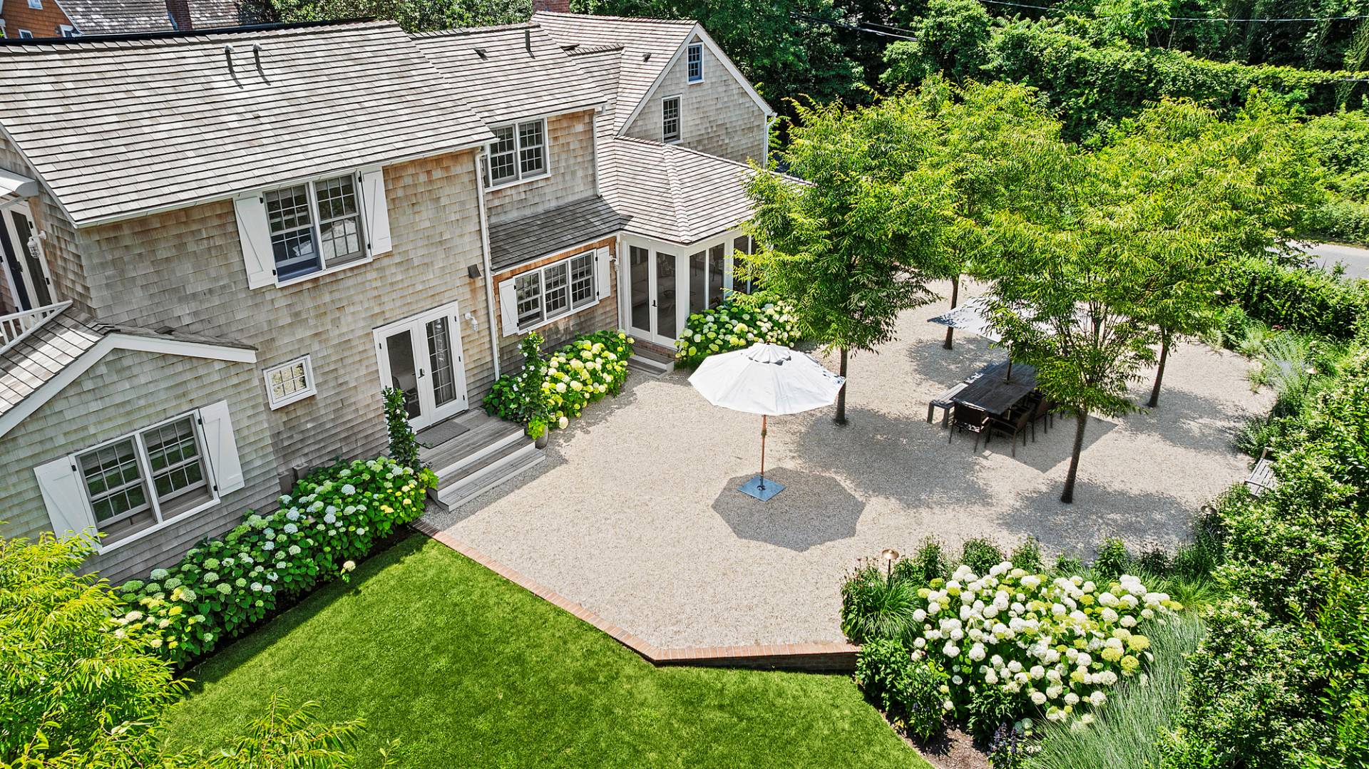 8 Fresh Pond Road Sag Harbor, NY 11963 - Photo 15 of 40 a view of a back yard of the house