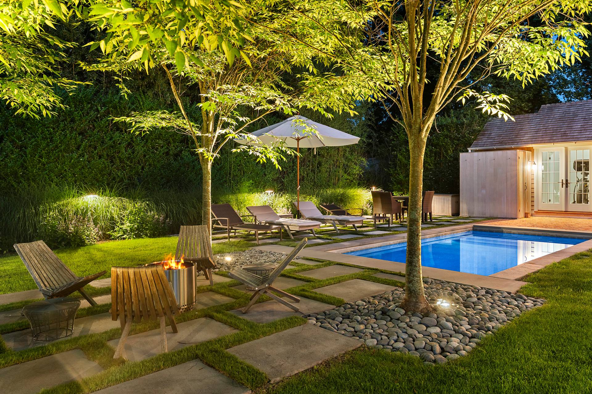 8 Fresh Pond Road Sag Harbor, NY 11963 - Photo 18 of 40 a view of a house with swimming pool and sitting area