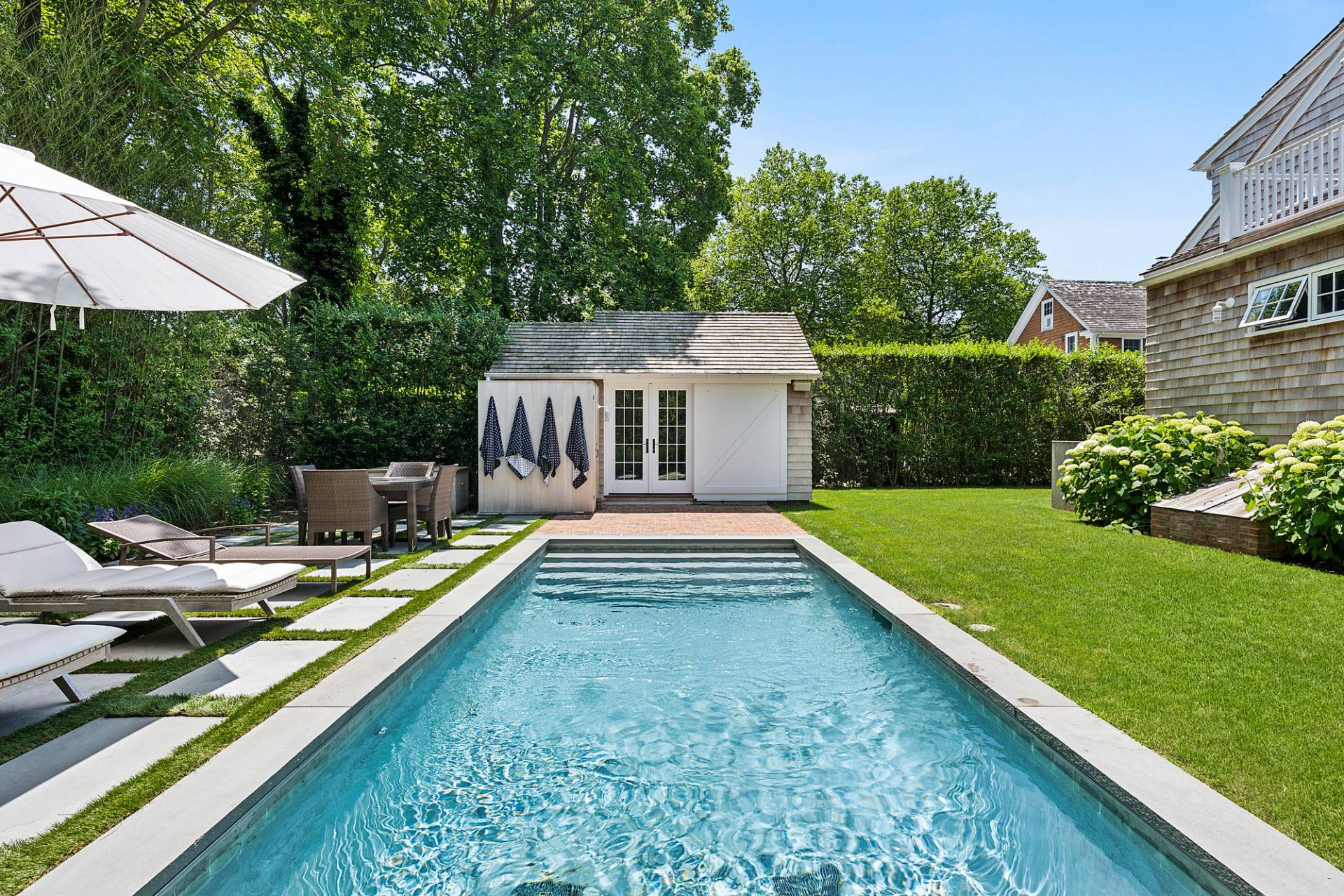 8 Fresh Pond Road Sag Harbor, NY 11963 - Photo 19 of 40 swimming pool view with a seating space