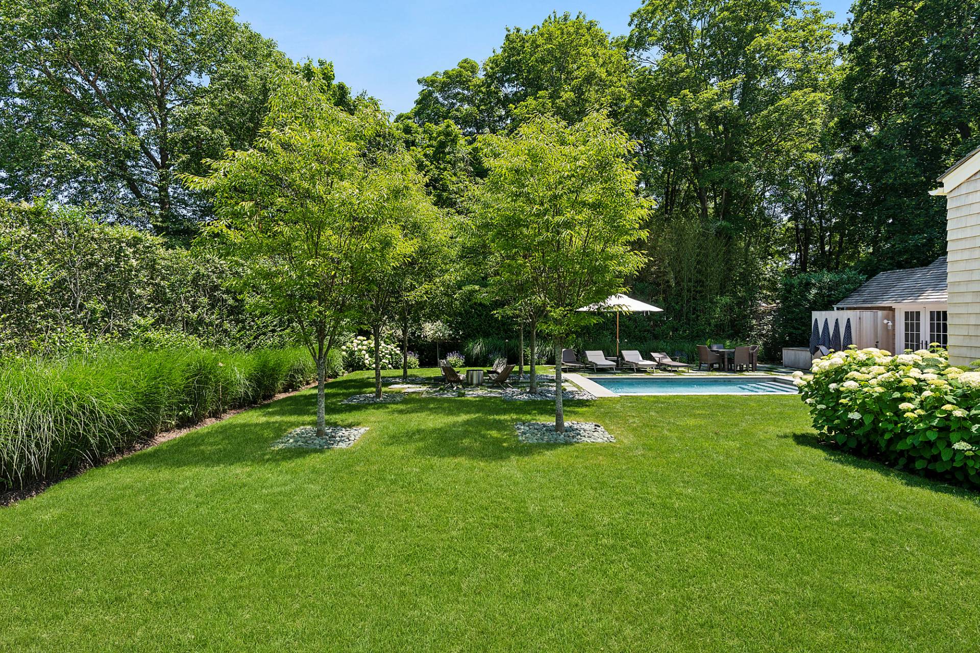 8 Fresh Pond Road Sag Harbor, NY 11963 - Photo 20 of 40 a view of a house with a yard