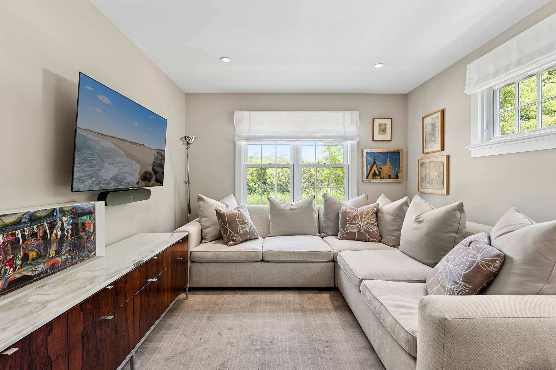 8 Fresh Pond Road Sag Harbor, NY 11963 - Photo 26 of 40 a living room with furniture and a flat screen tv