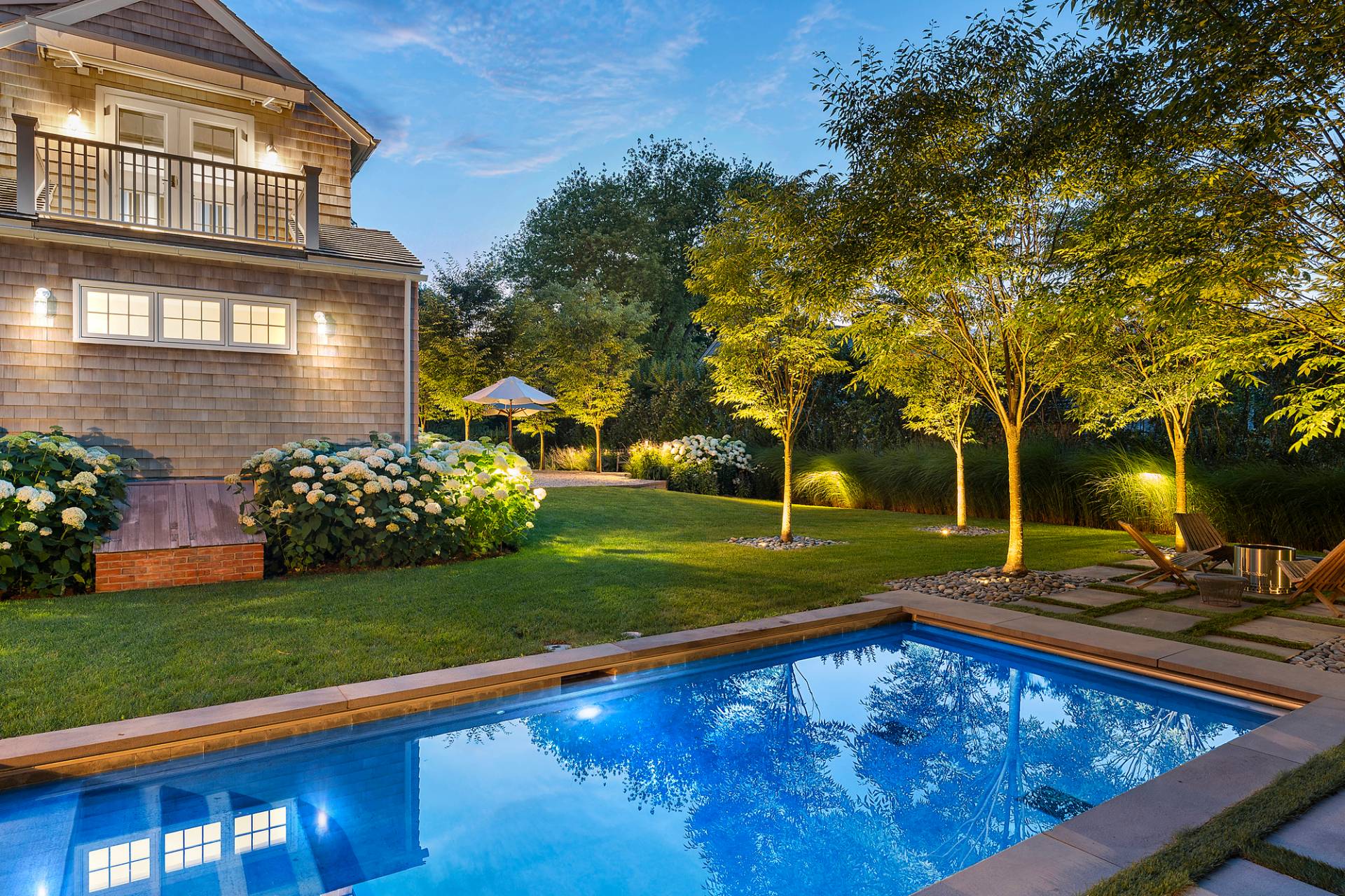 8 Fresh Pond Road Sag Harbor, NY 11963 - Photo 3 of 40 a view of a backyard with sitting area