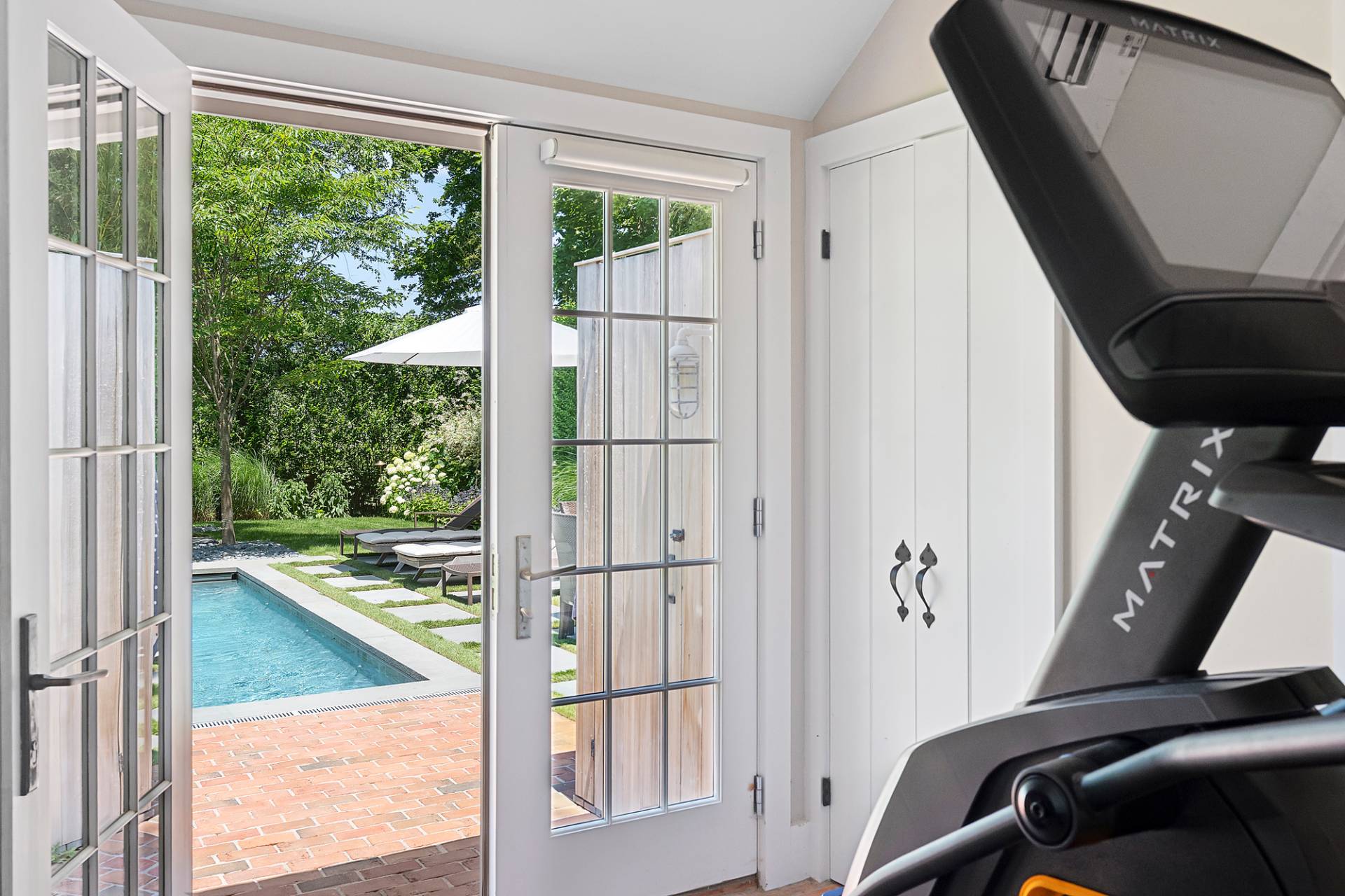 8 Fresh Pond Road Sag Harbor, NY 11963 - Photo 33 of 40 a view of a balcony with furniture and windows
