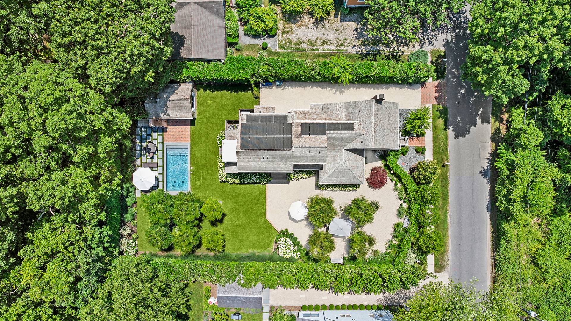 8 Fresh Pond Road Sag Harbor, NY 11963 - Photo 39 of 40 an aerial view of a house with a garden and trees