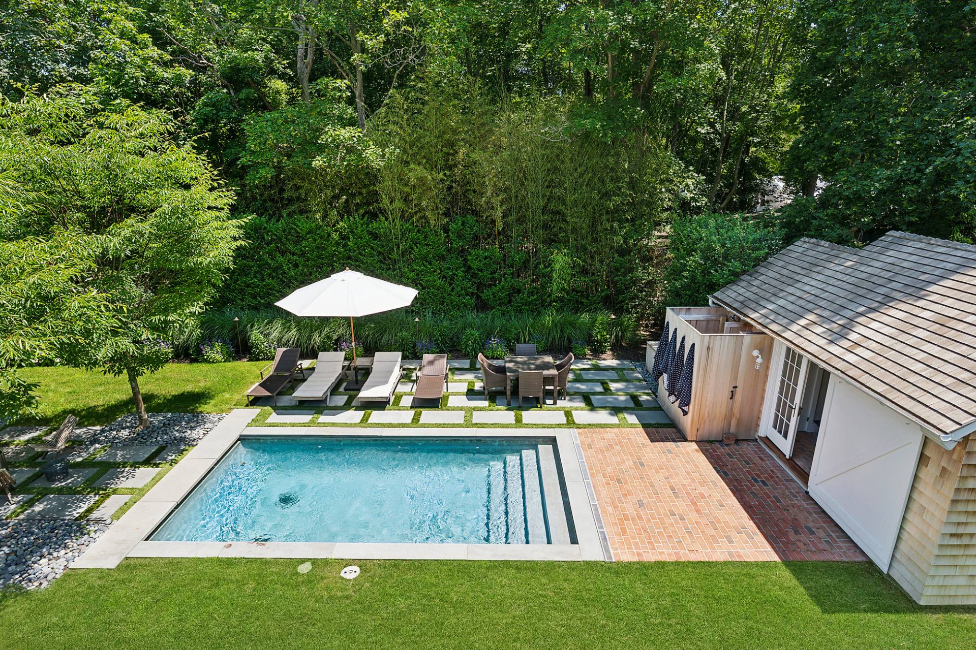 8 Fresh Pond Road Sag Harbor, NY 11963 - Photo 5 of 40 a view of swimming pool with outdoor seating