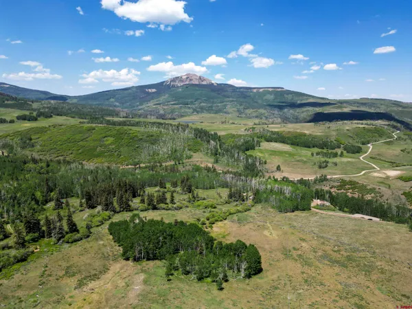 a view of a lake with a mountain in the background