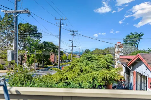 a house view with a garden space