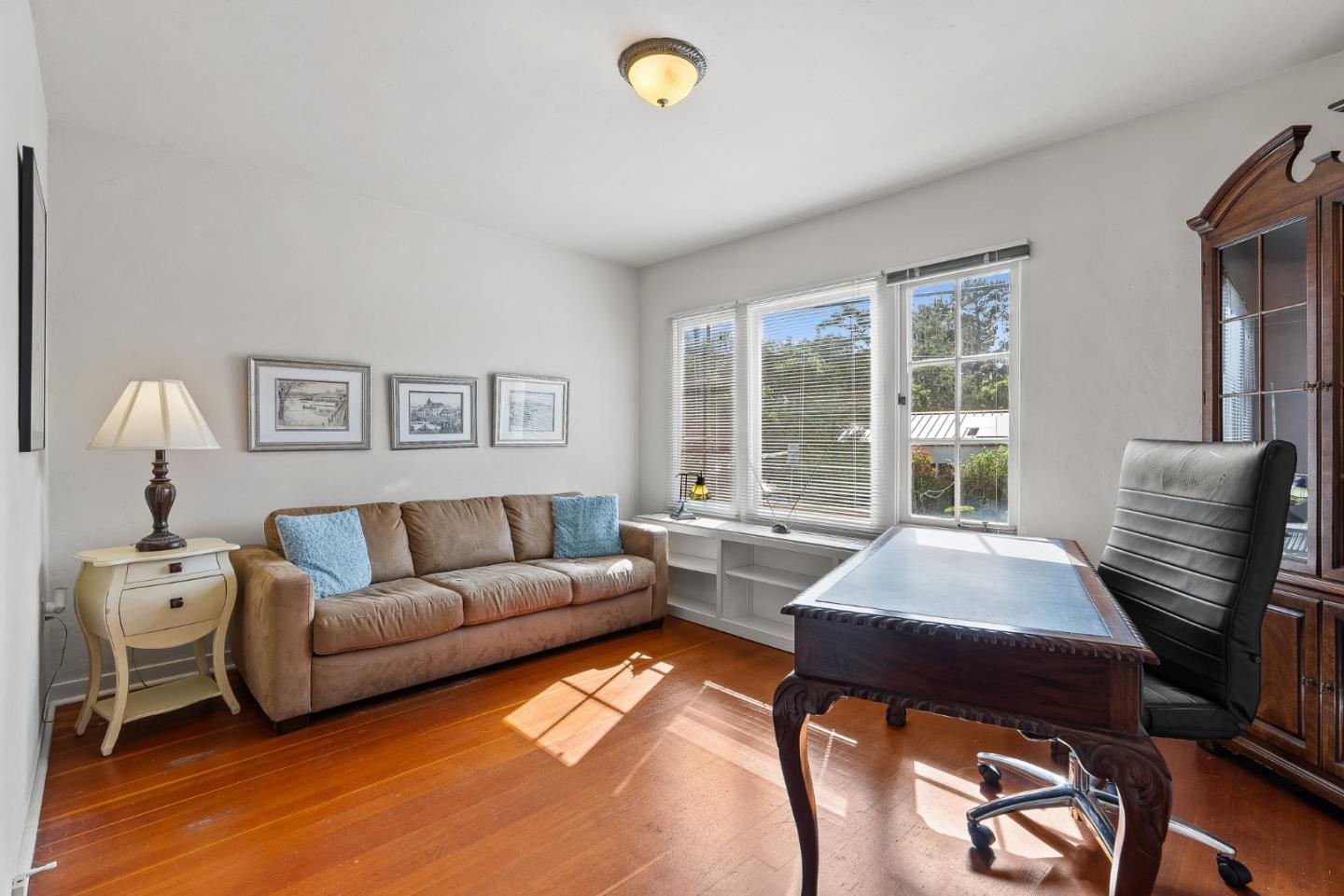 925 Cass Street Monterey, CA 93940 - Photo 15 of 27 a living room with furniture and a window