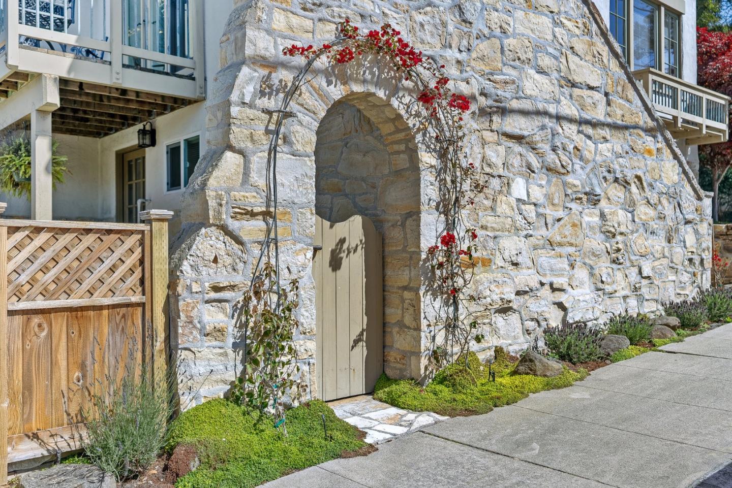 925 Cass Street Monterey, CA 93940 - Photo 3 of 27 a front view of a house with a tree