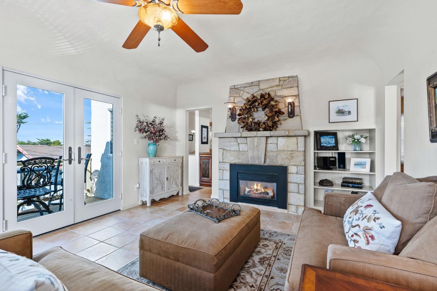 925 Cass Street Monterey, CA 93940 - Photo 5 of 27 a living room with furniture and a fireplace