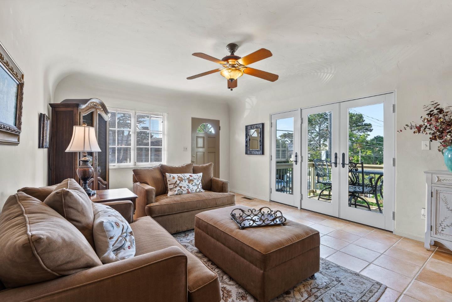 925 Cass Street Monterey, CA 93940 - Photo 6 of 27 a living room with furniture and a large window