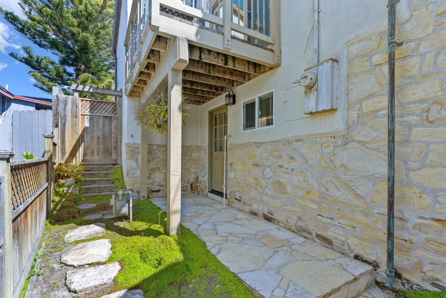925 Cass Street Monterey, CA 93940 - Photo 10 of 27 a aerial view of a house with a big yard and potted plants