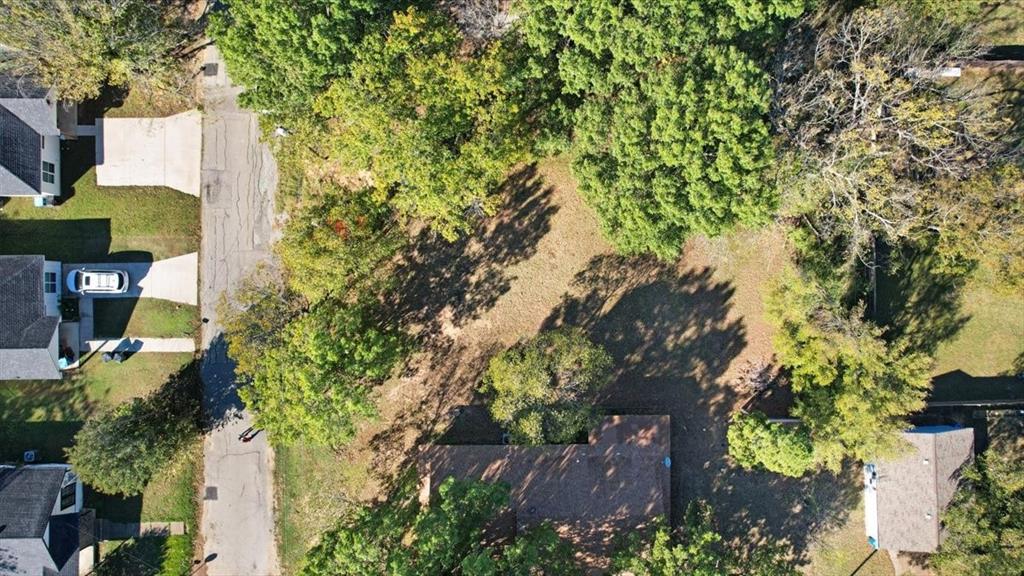 603 West Star Street Denison, TX 75020 - Photo 7 of 8 an aerial view of a house with a yard basket ball court and outdoor seating