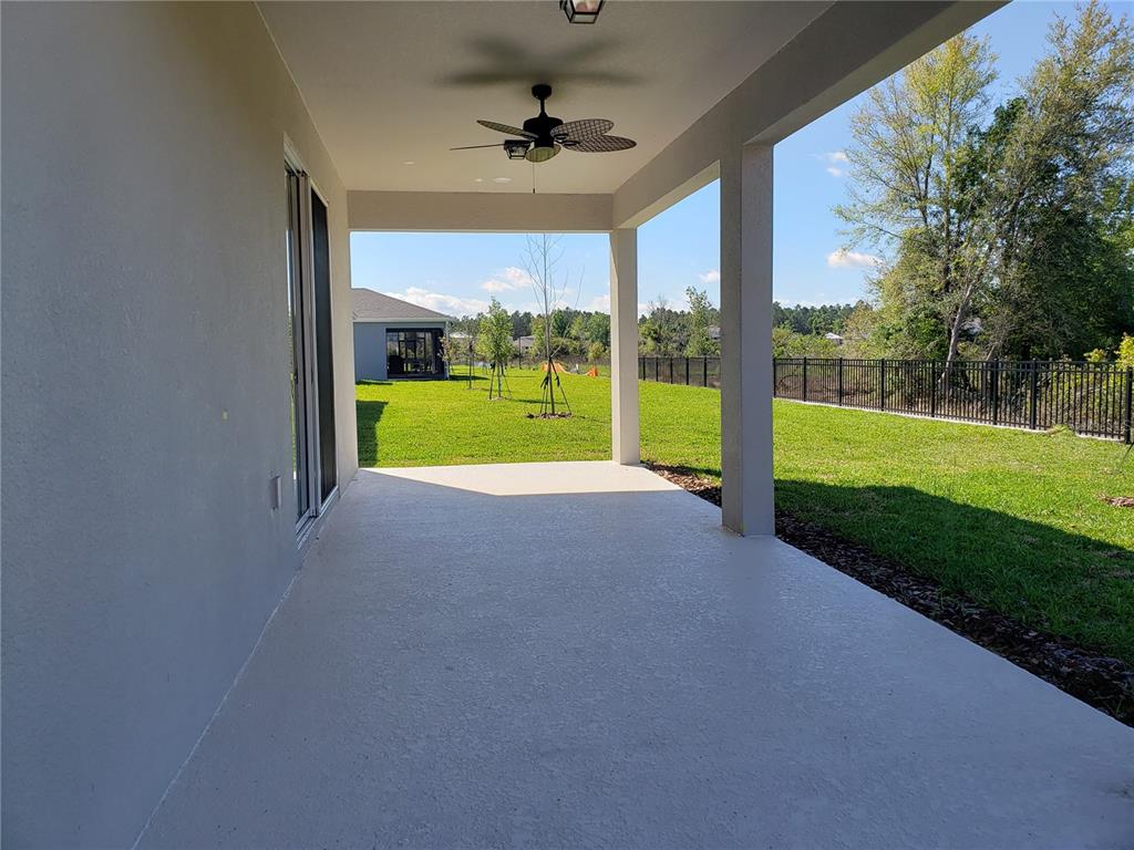 17244 Cagan Crossings Boulevard Clermont, FL 34714 - Photo 14 of 14 a view of a big room with a big yard