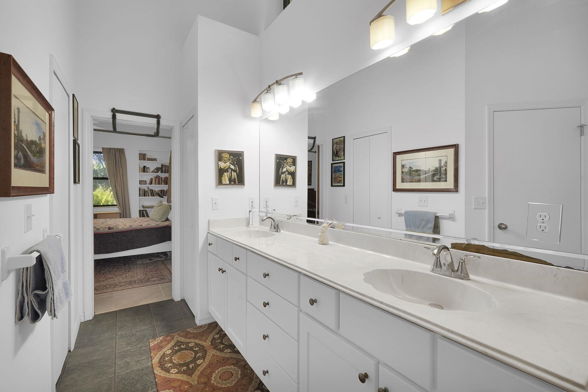 3372 Kings Road South St. Augustine, FL 32086 - Photo 19 of 48 a en suite bathroom with double sink and a mirror