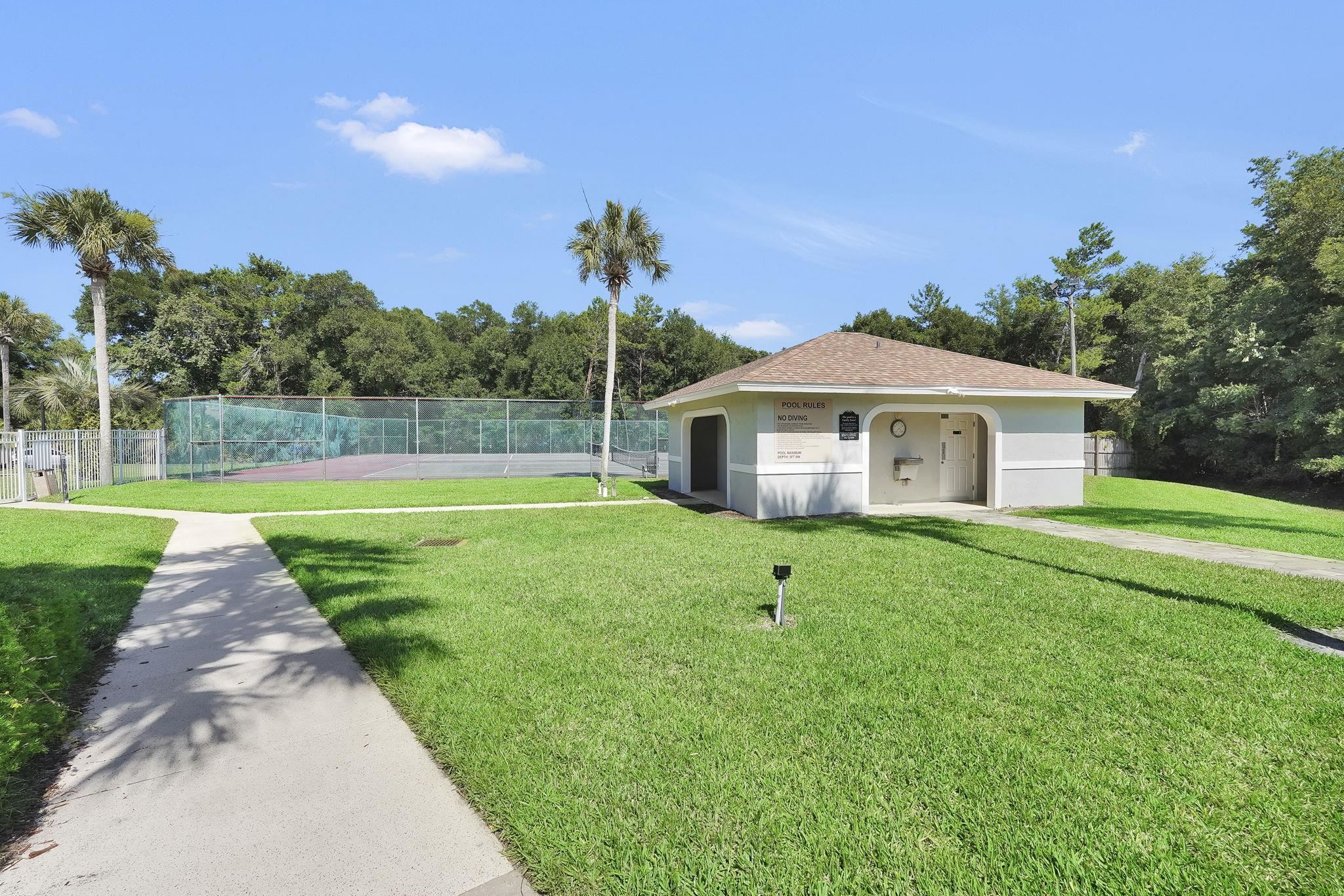 3372 Kings Road South St. Augustine, FL 32086 - Photo 32 of 48 a view of a house with a yard