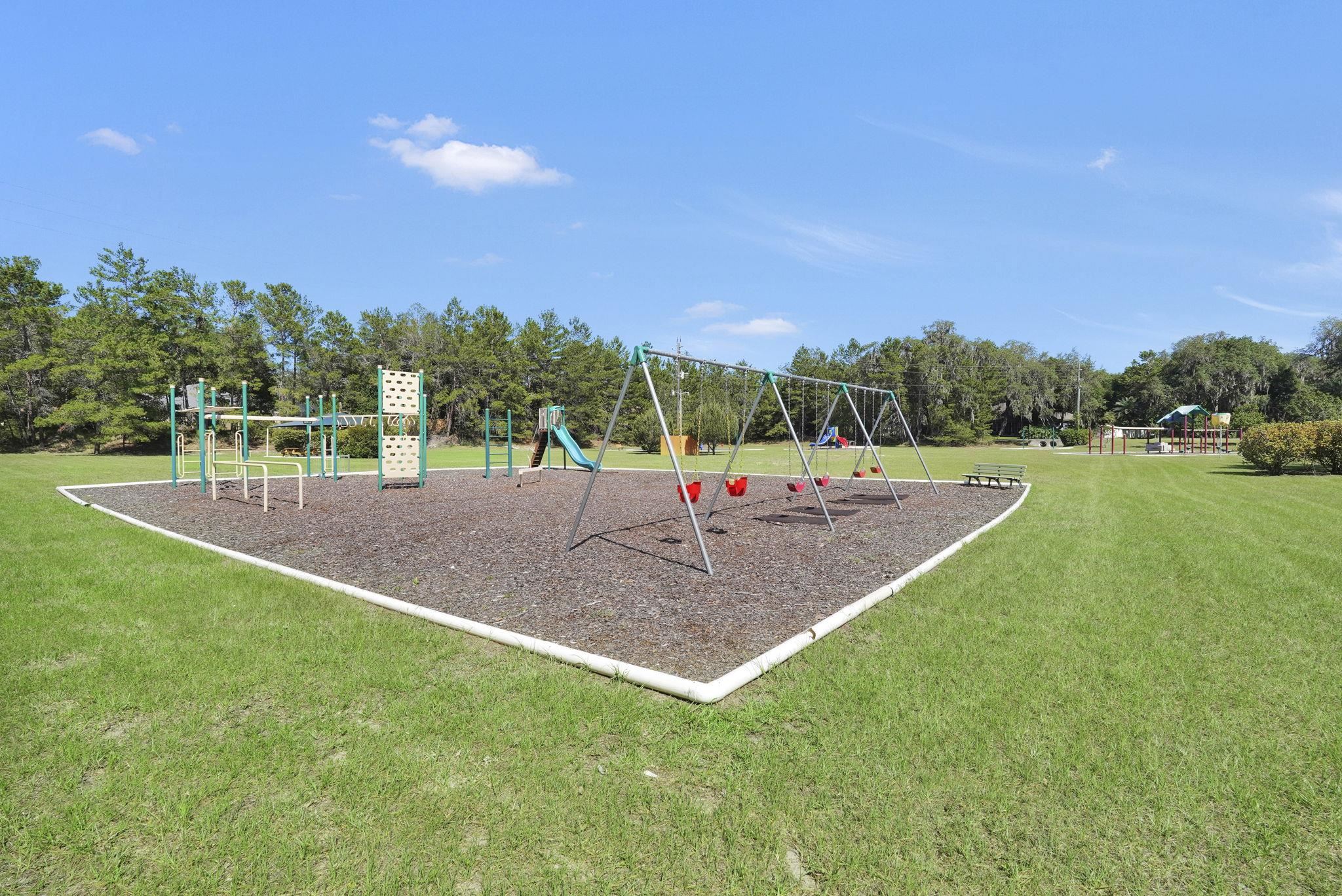 3372 Kings Road South St. Augustine, FL 32086 - Photo 33 of 48 a view of outdoor space with green field and trees