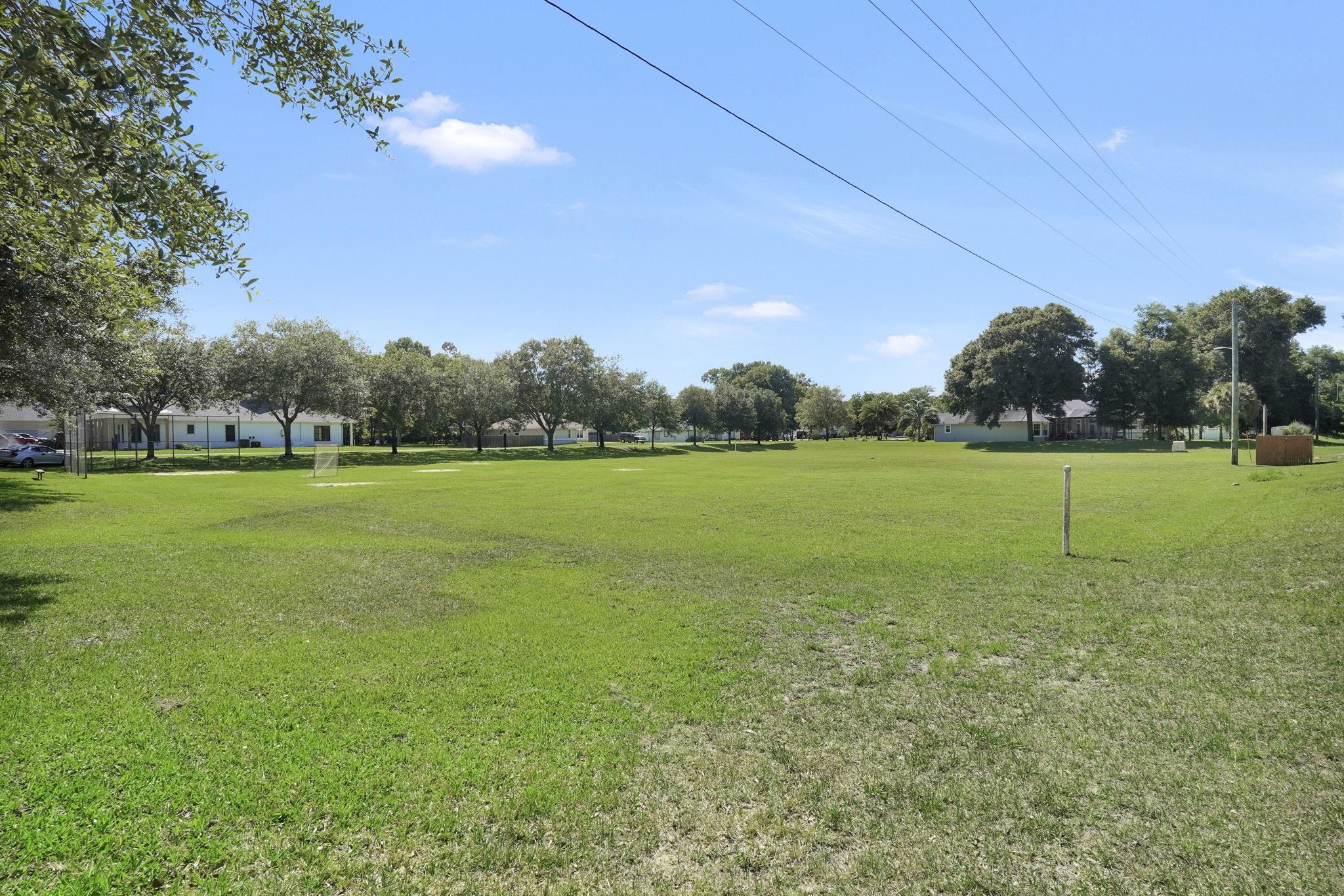 3372 Kings Road South St. Augustine, FL 32086 - Photo 35 of 48 a view of a golf course with a lake
