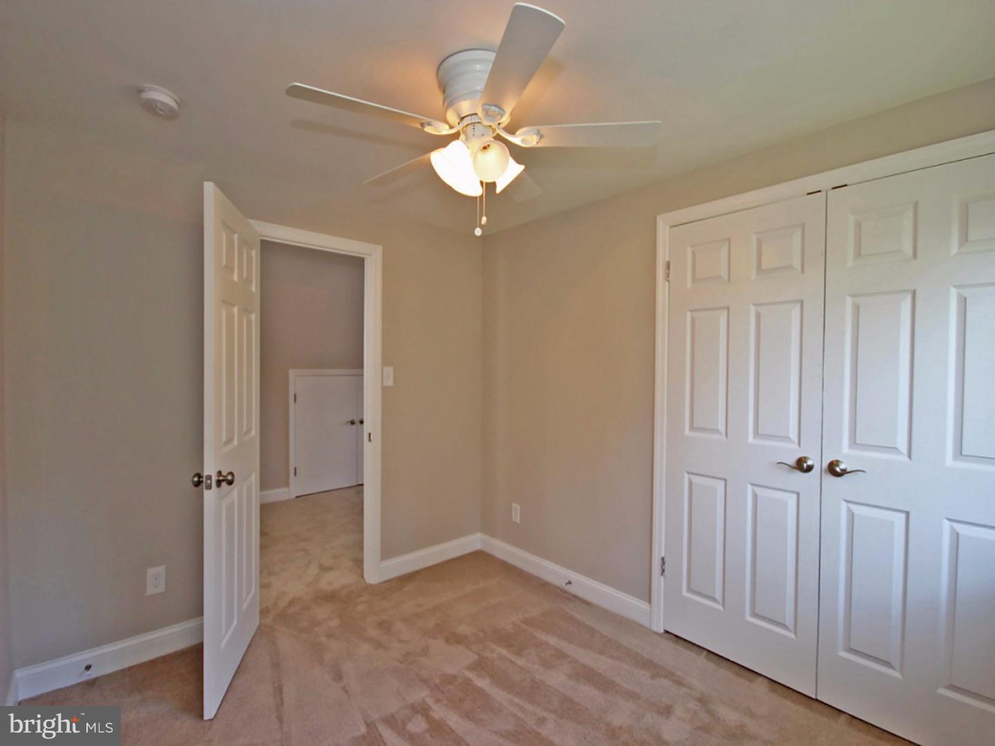 449 Pinecrest Road Springfield, PA 19064 - Photo 15 of 25 a view of an empty room with a fan