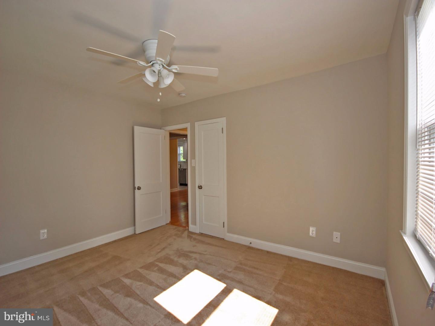 449 Pinecrest Road Springfield, PA 19064 - Photo 18 of 25 wooden floor in an empty room with a window