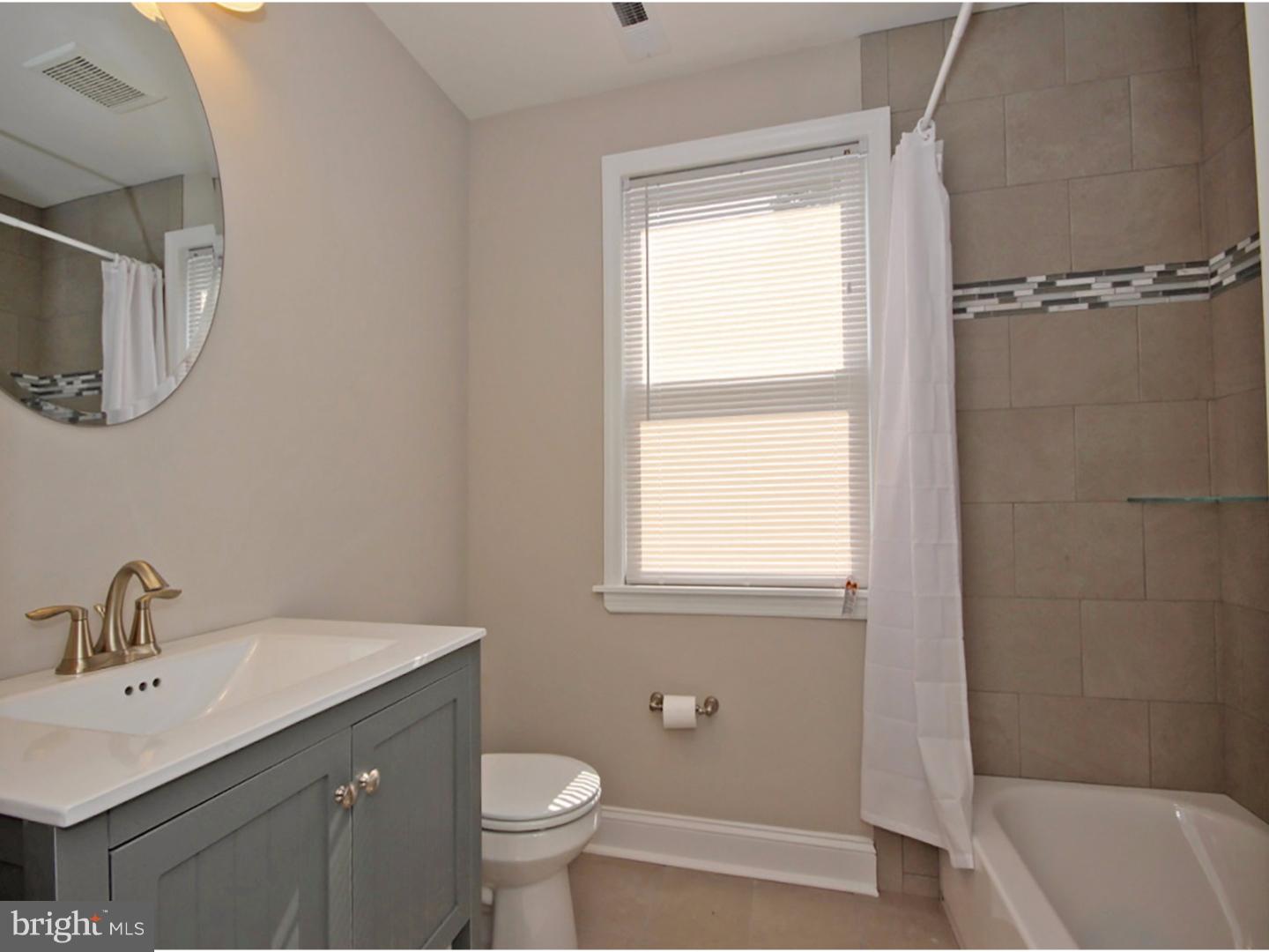 449 Pinecrest Road Springfield, PA 19064 - Photo 19 of 25 a bathroom with a sink toilet and shower