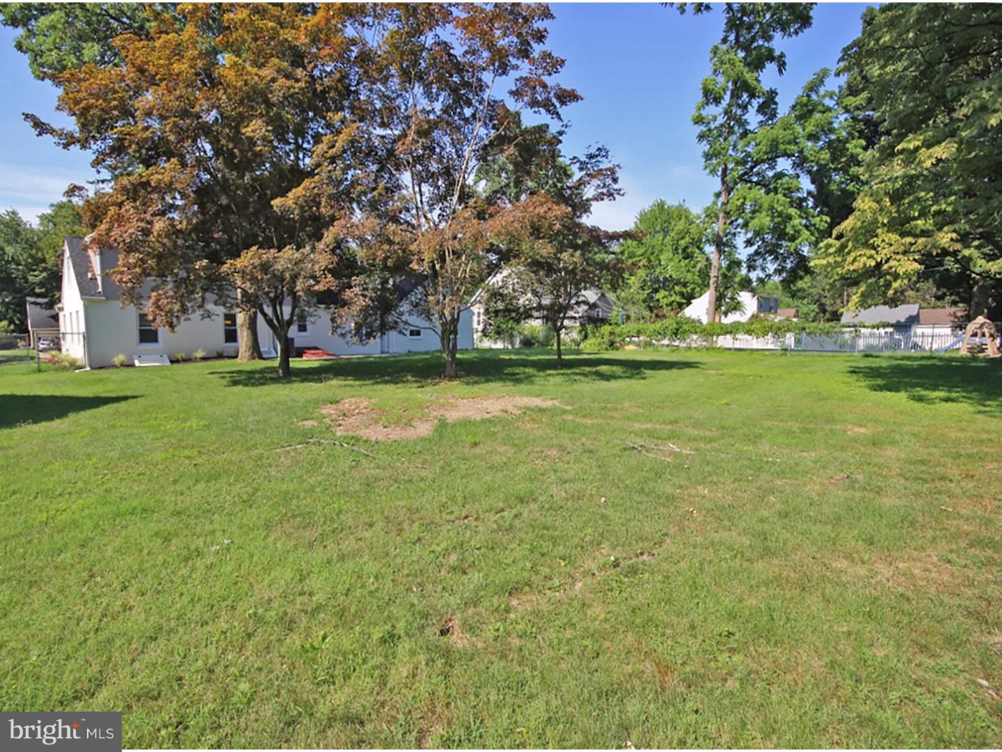 449 Pinecrest Road Springfield, PA 19064 - Photo 22 of 25 a big yard with lots of green space and trees