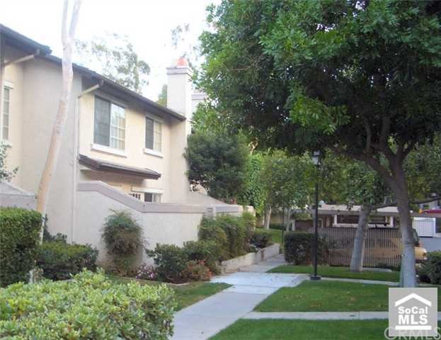 43 Exeter, Unit 19 Irvine, CA 92612 - Photo 1 of 1 Front of the home with large greenbelt