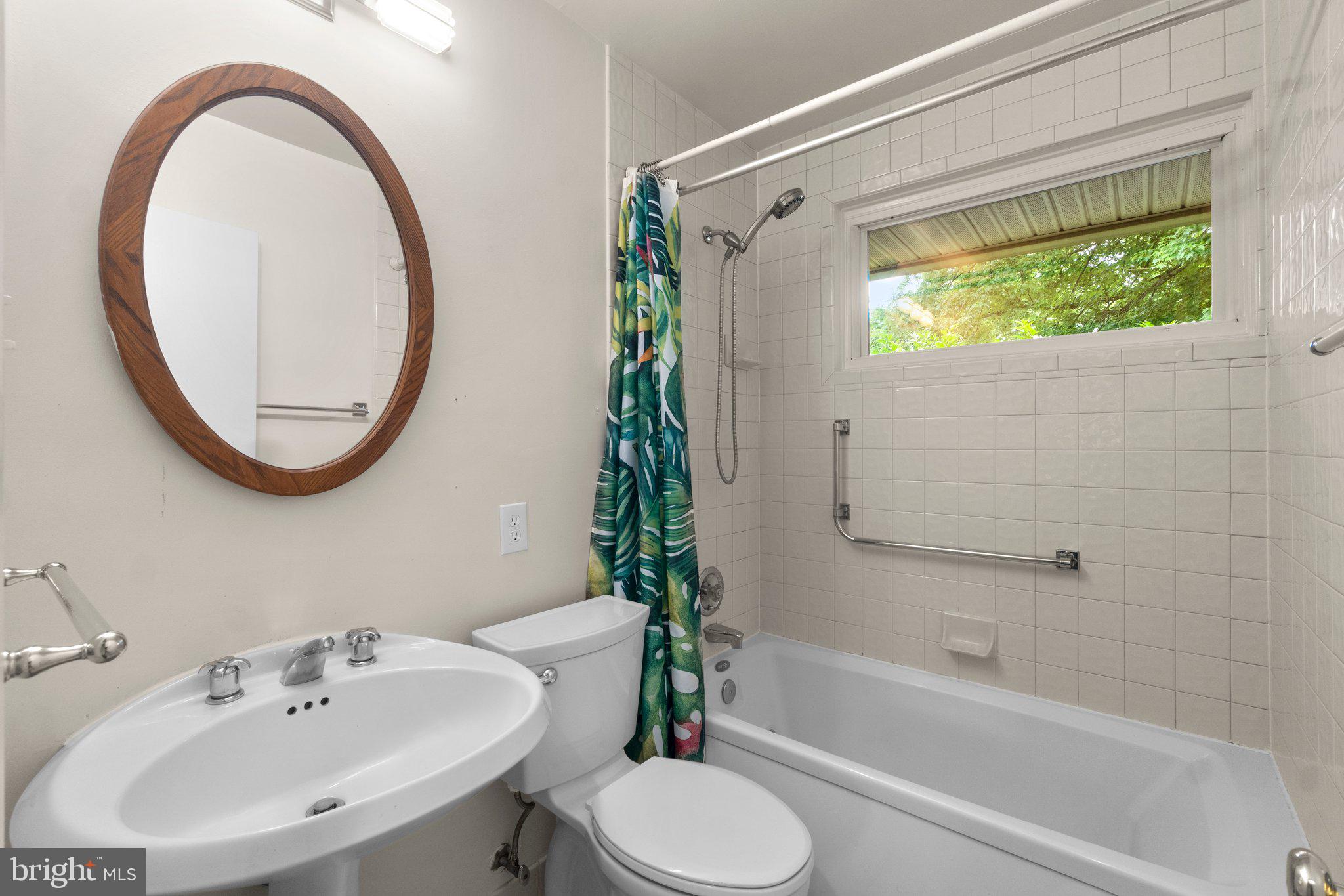 7303 Foxe Place Springfield, VA 22151 - Photo 13 of 38 Full Bathroom with natural light