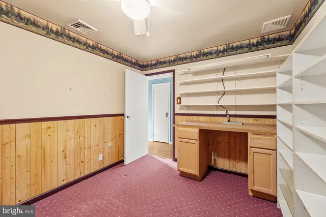 a view of an empty room and window