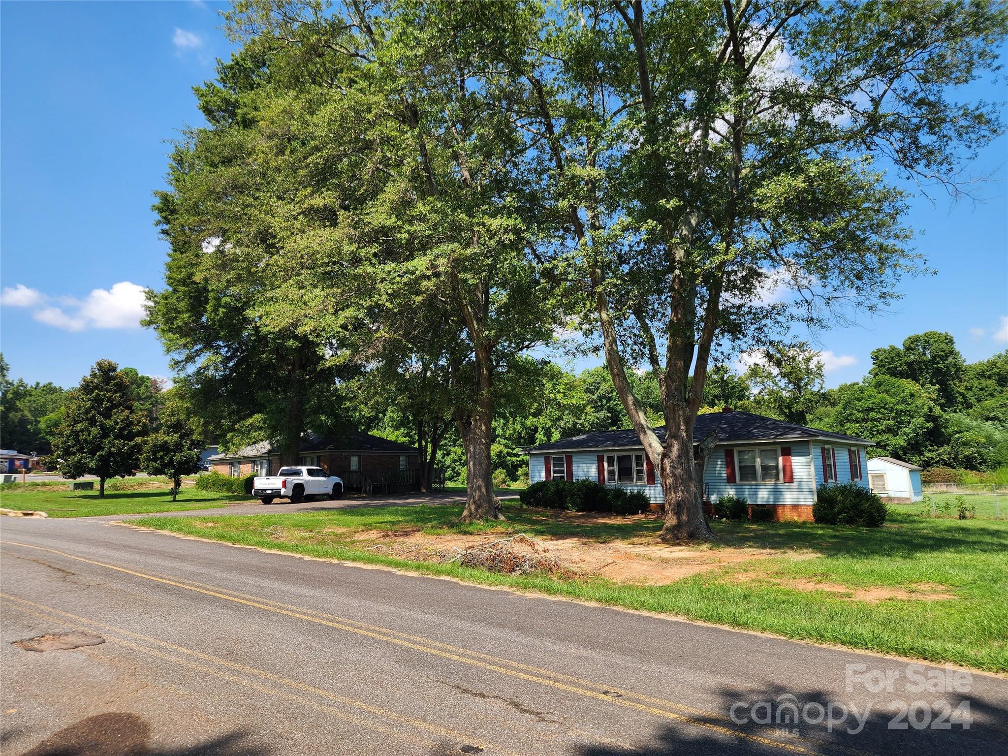 3708 Celanese Road Rock Hill, SC 29732 - Photo 24 of 45 a view of a house with a yard and large trees
