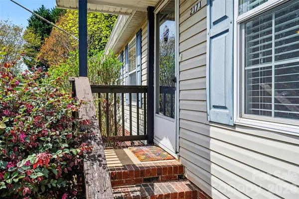 a view of livingroom with furniture and staircase