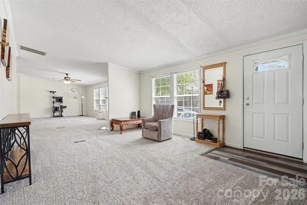 a room with furniture and a window