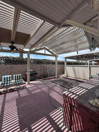 a kitchen with a table and chairs
