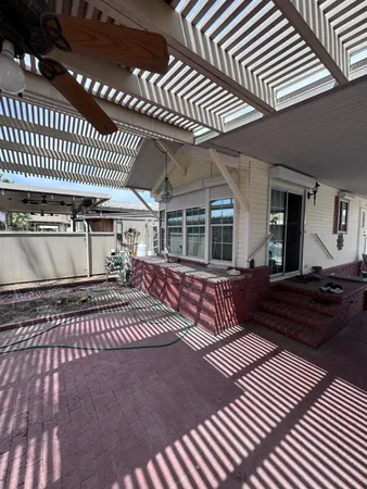 a view of a porch with furniture